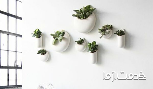 استفاده از گلدان دیواری در چیدمان گل در خانه