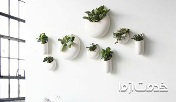 استفاده از گلدان دیواری در چیدمان گل در خانه