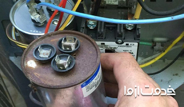 قرار دادن خازن جدید برای تعویض فن کولر پنجره ای