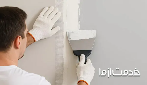 چسباندن نوار درزگیر برای بتونه کاری کناف