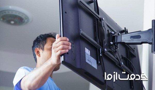 نصاب تلویزیون روی دیوار